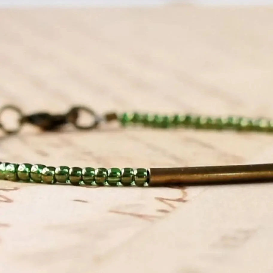 Fern green seed bead, bronze bar bracelet