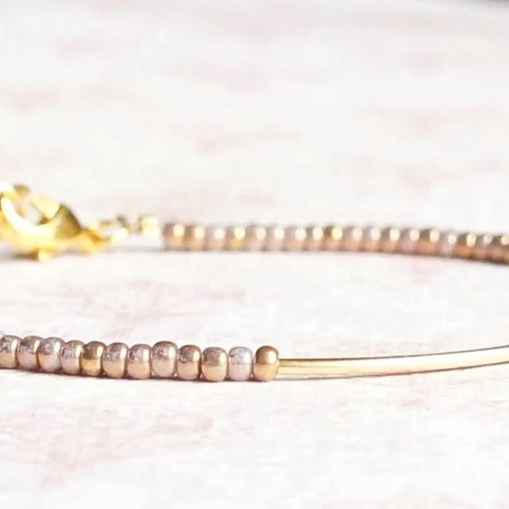 Gilded seed bead, gold filled bar bracelet