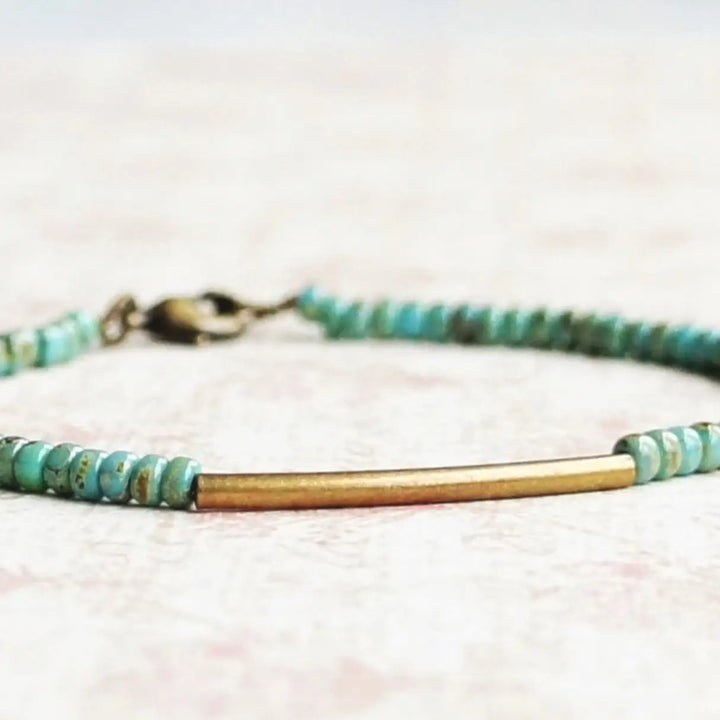 Turquoise blue seed bead, bronze bar bracelet